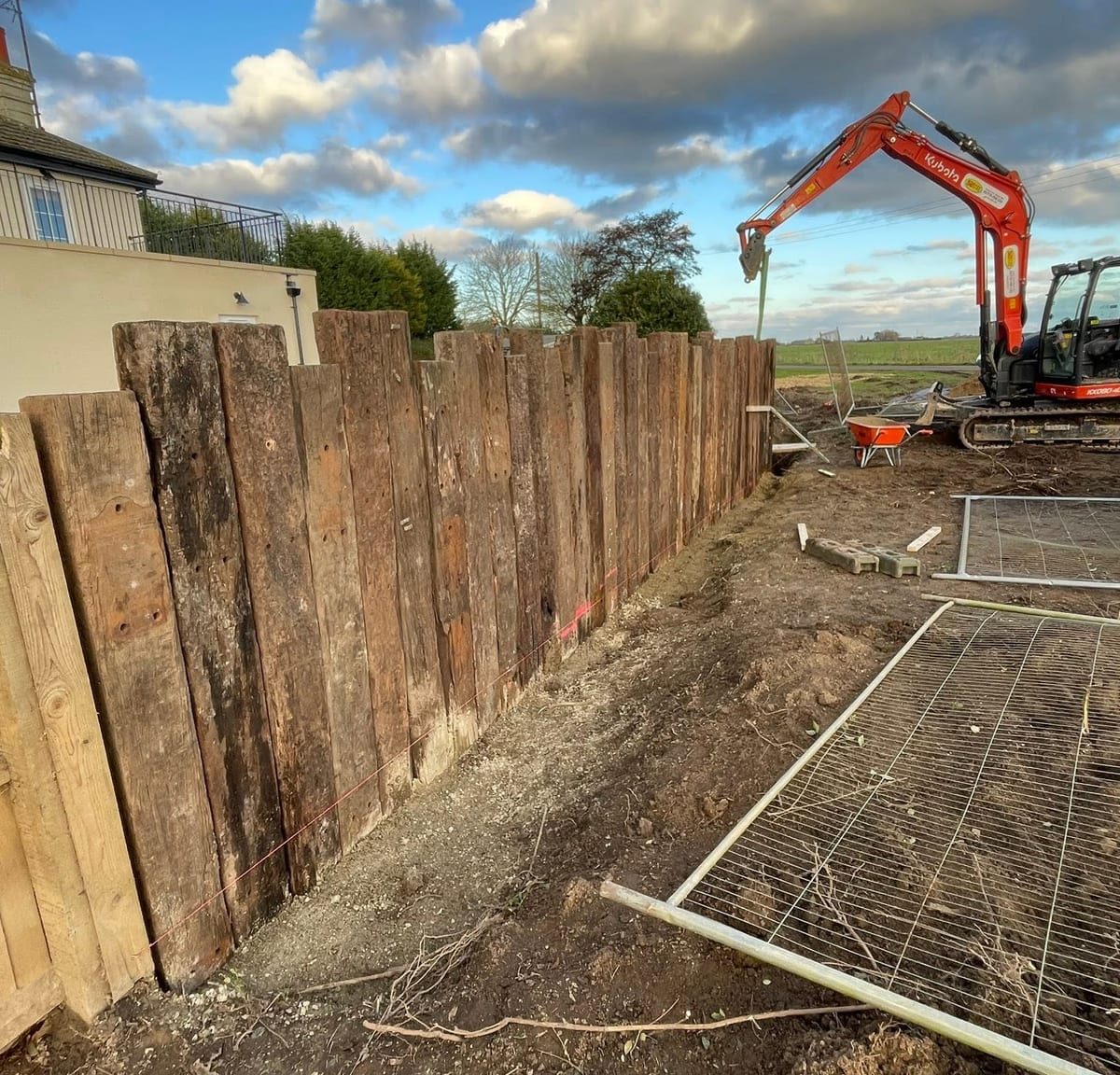 Sleeper retaining wall and excavation, by J.E. Jones, groundworks and earthworks contractors, Lincolnshire